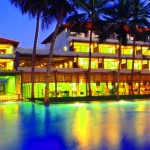 Blue water resorts view from the beach over the pool